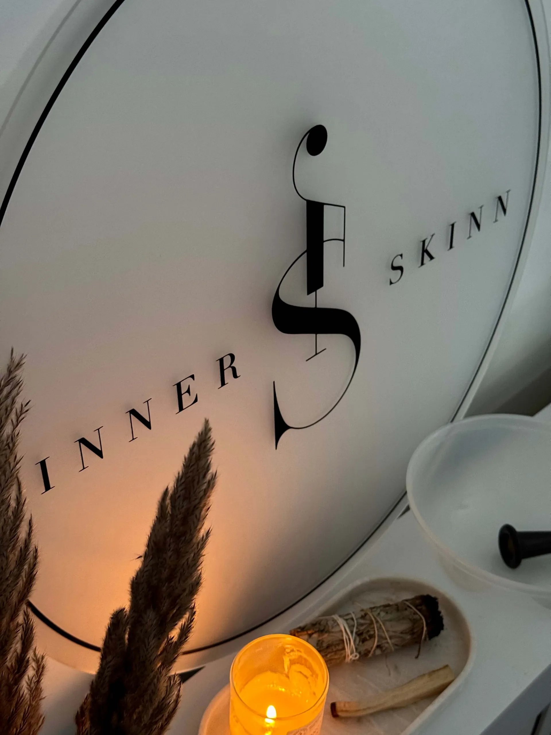 Inner Skinn logo on the wall of the home-based clinic